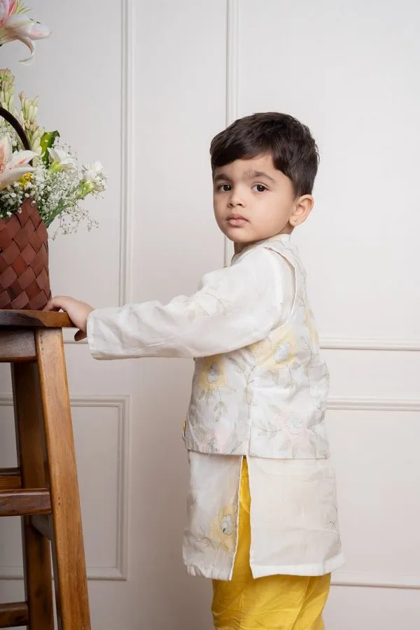 Elegant ivory kurta with matching embroidered jacket and vibrant yellow churidar pants, a stylish ensemble for festive occasions