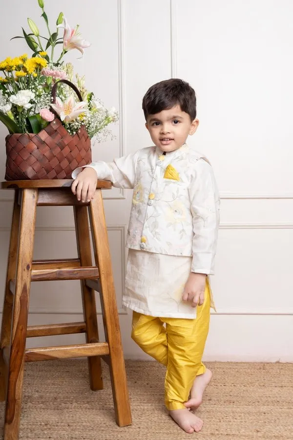 Elegant ivory kurta with matching embroidered jacket and vibrant yellow churidar pants, a stylish ensemble for festive occasions